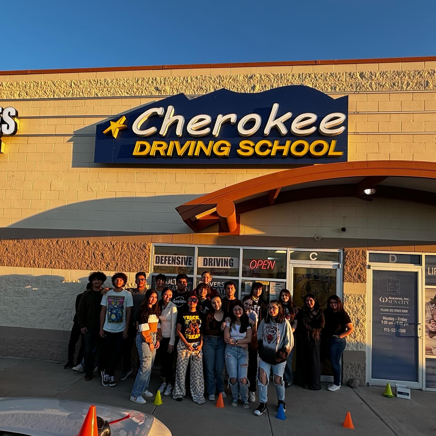 Cherokee Driving School students gathered outside the El Paso school